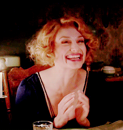 Queenie Goldstein smiles and giggles. Fantastic Beasts And Where To Find Them (November 2016)